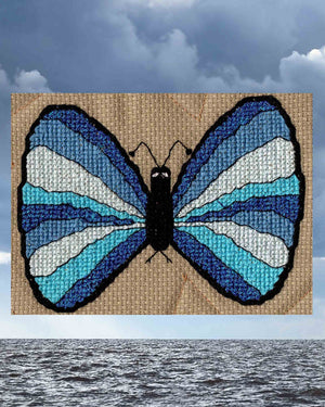 Blue butterfly cross stitch pattern for sale is part of Magic Butterflies Cross Stitch Pattern for sale at Raspberry Lane Crafts including six patterns red green yellow green purple orange butterflies download PDF digital pattern at www.raspberrylanecrafts.com