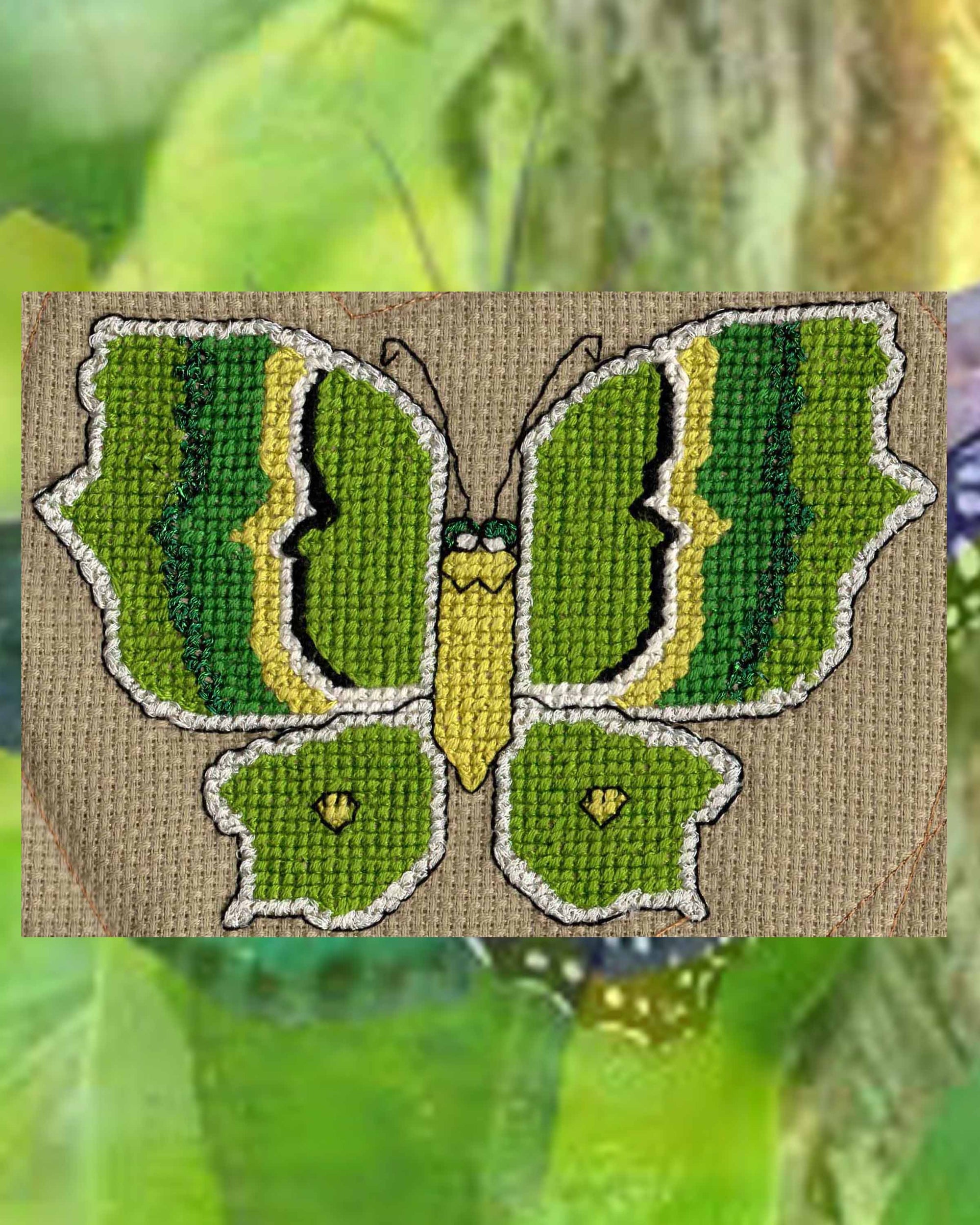Green Butterfly with stripes of green black and white is one of six butterflies featured in Magic Butterfly Collection Cross Stitch Pattern download PDF digital file for sale at www.raspberrylanecrafts.com.  Not available on etsy.com or amazon or facebook Designed by Wendy Christine American artist and available internationally and in the U.S.A.  Made in the US.  Thanks for your purchase!