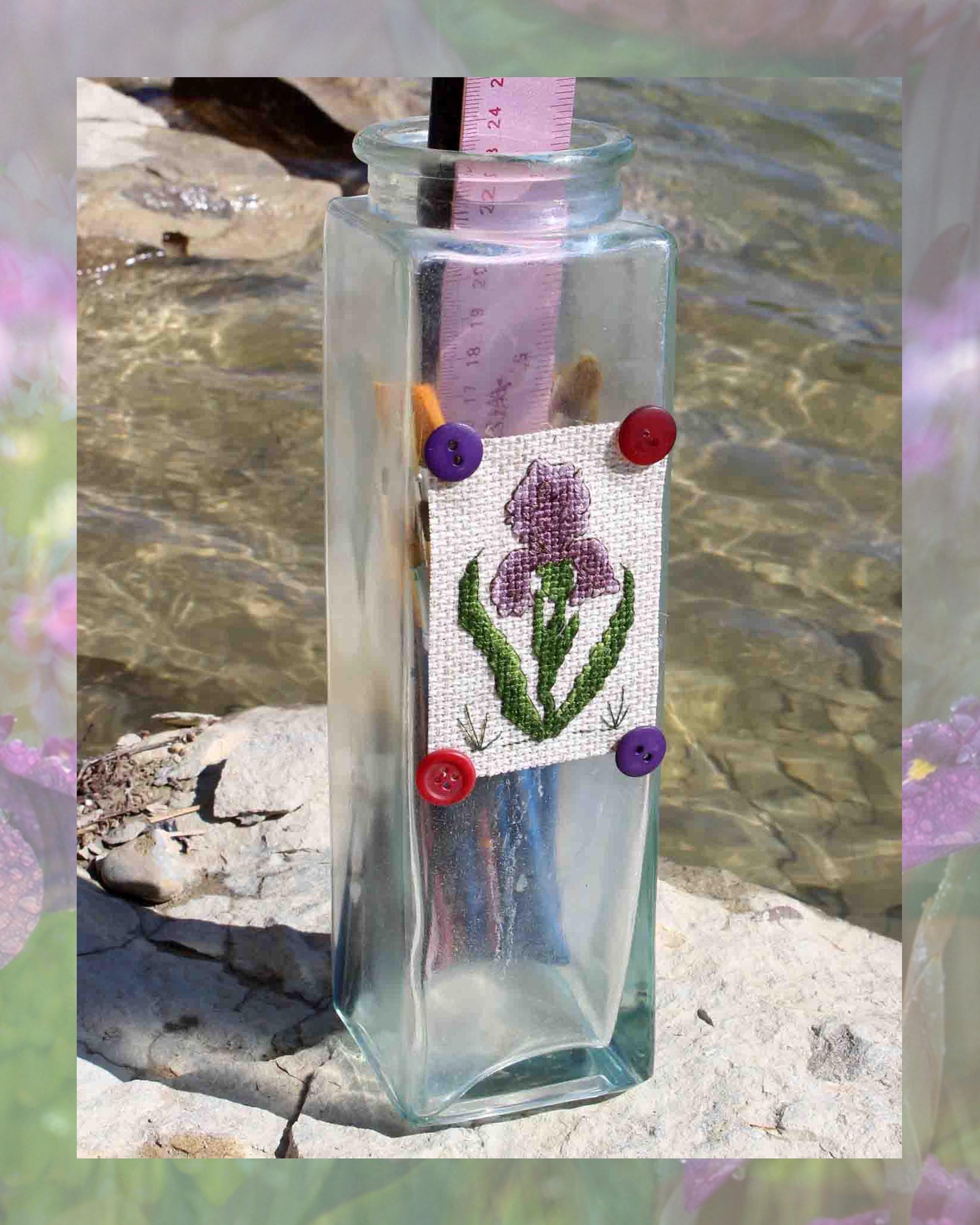 Purple Iris Cross Stitch Pattern features lavender iris with two-tone green leaves and grass blades with jar craft pattern directions is one of four patterns in the Antique Flower Cross Stitch Pattern download PDF digital file for sale buy purchase by Wendy Christine