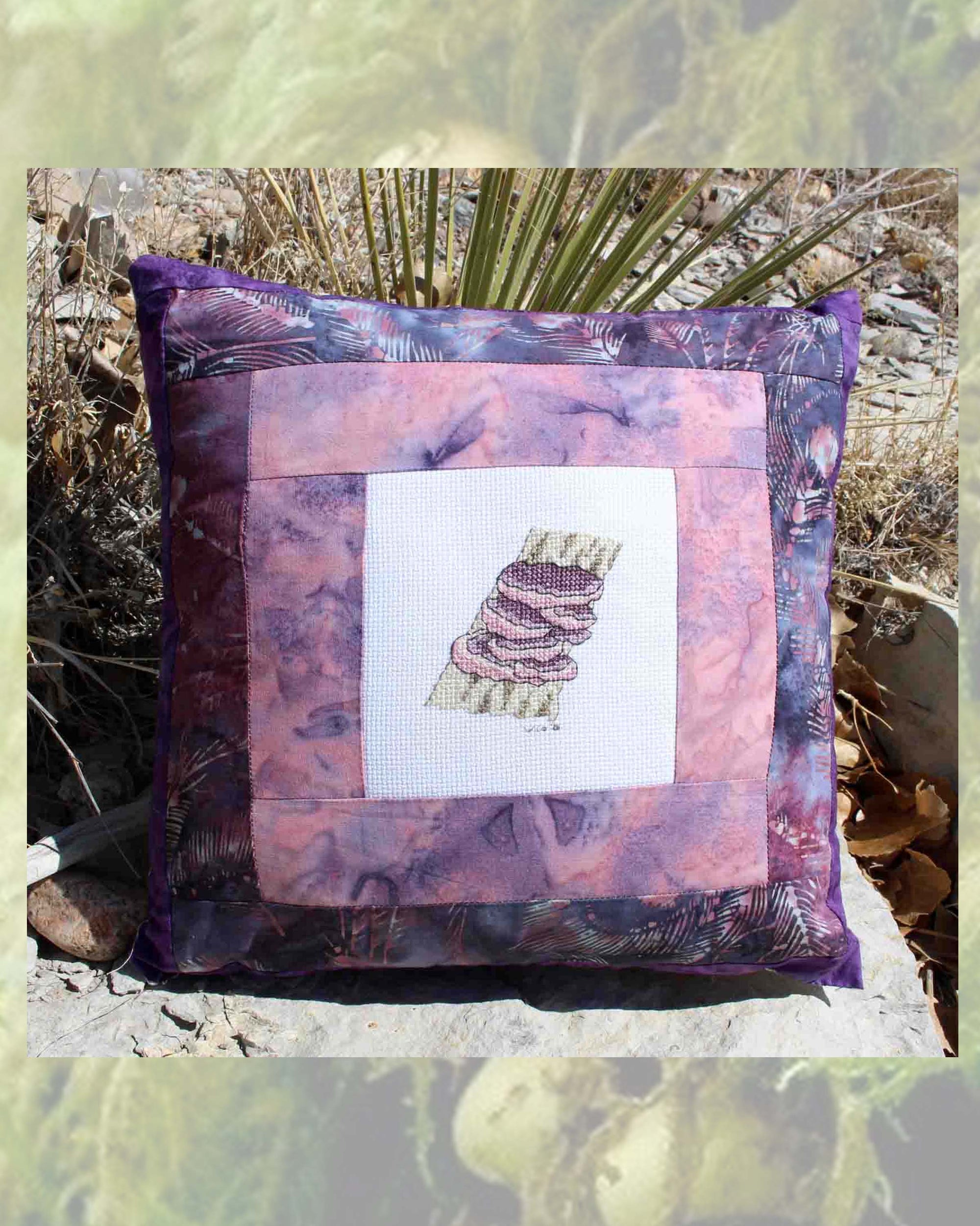 Purple Rosy Shade Polypore Pillow cross stitch pattern with directions for sale at Raspberry Lane Crafts.  Included in the Dance of Mushrooms Collection and part of six mushroom cross-stitch patterns for sale by American artist Wendy Christine.  Thank you gratefully for your purchase and support of an American company.
