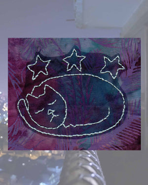 Raspberry Lane Crafts Starry Cat Embroidery Pattern PDF Download for sale buy purchase features a sleeping cat with tail curled around its body with three stars above it.  Design by Wendy Christine.  One of three cat designs in the Kitty Bazaar Embroidery Pattern.