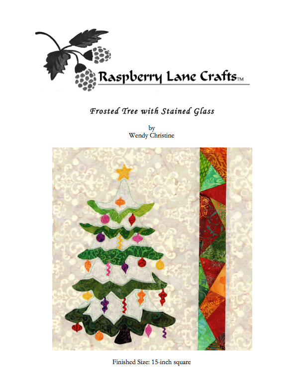 Frosted Tree Quilt Pattern features a Christmas tree with snow white and green branches decorated with holiday ornaments with a yellow star atop and stained glass strip.  Block #2 of the Stained Glass Christmas by Wendy Christine at Raspberry Lane Crafts.  Purchase, buy PDF download at www.raspberrylanecrafts.com

